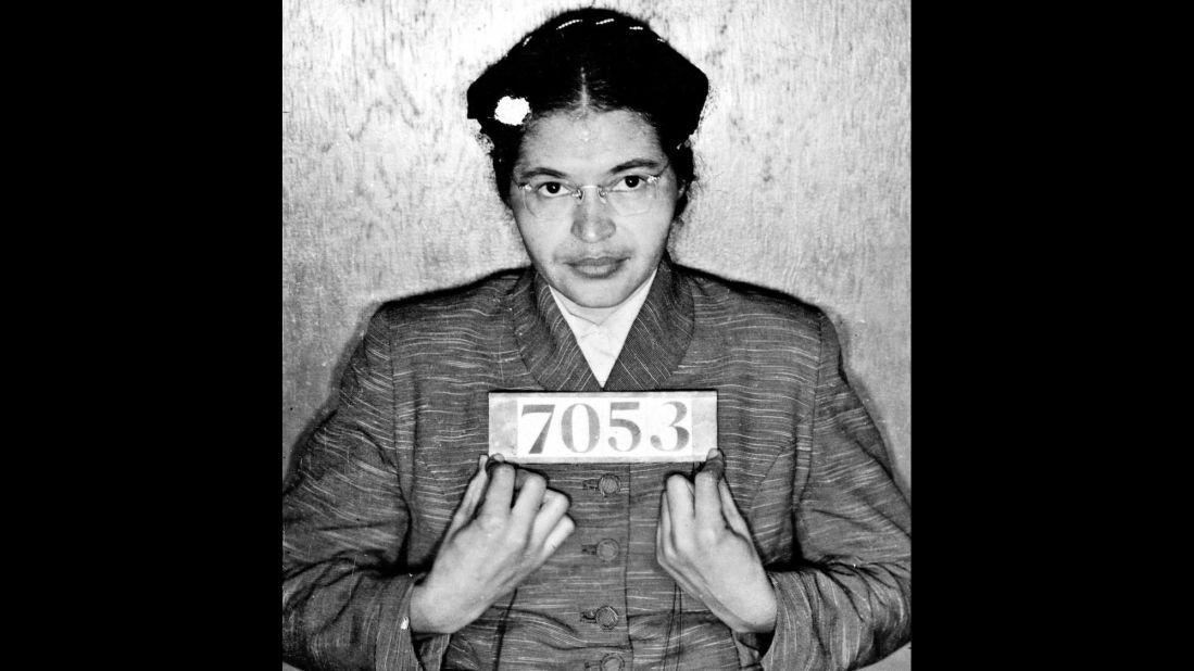 Rosa Parks poses for her booking photo after she was arrested in Montgomery, Alabama, for refusing to give up her bus seat to a white passenger in 1955.