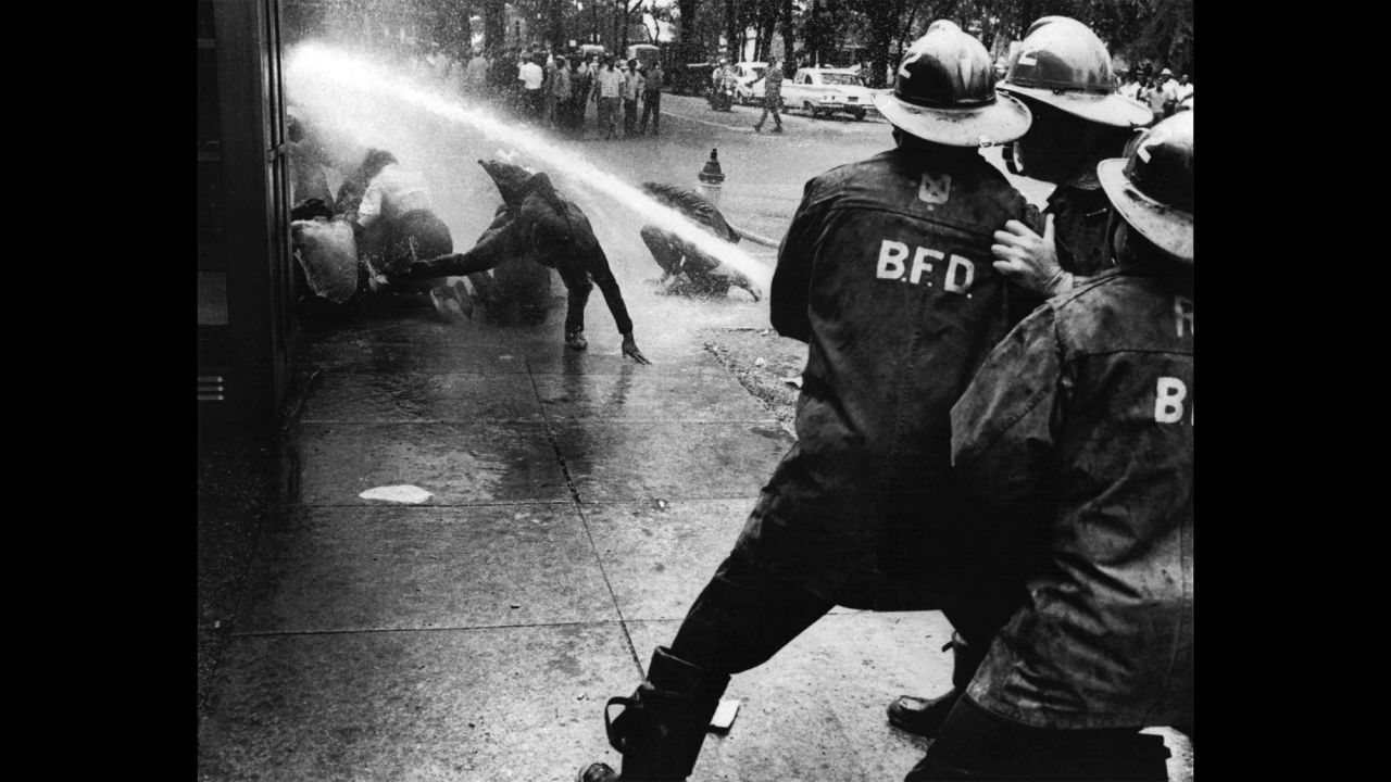 Firefighters turn their hoses on demonstrators in Birmingham in July 1963. When civil rights protesters stalled in Birmingham, the city's African-American children took to the streets. Their bravery facing water hoses and dogs riveted the nation.