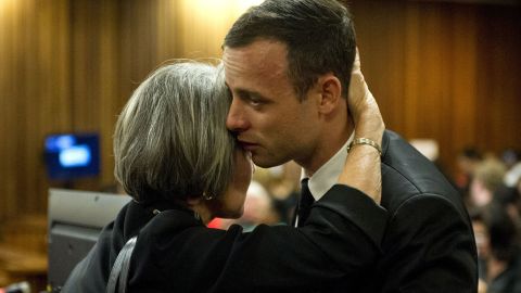 Pistorius is hugged by his aunt Lois Pistorius in court on Monday, April 7.