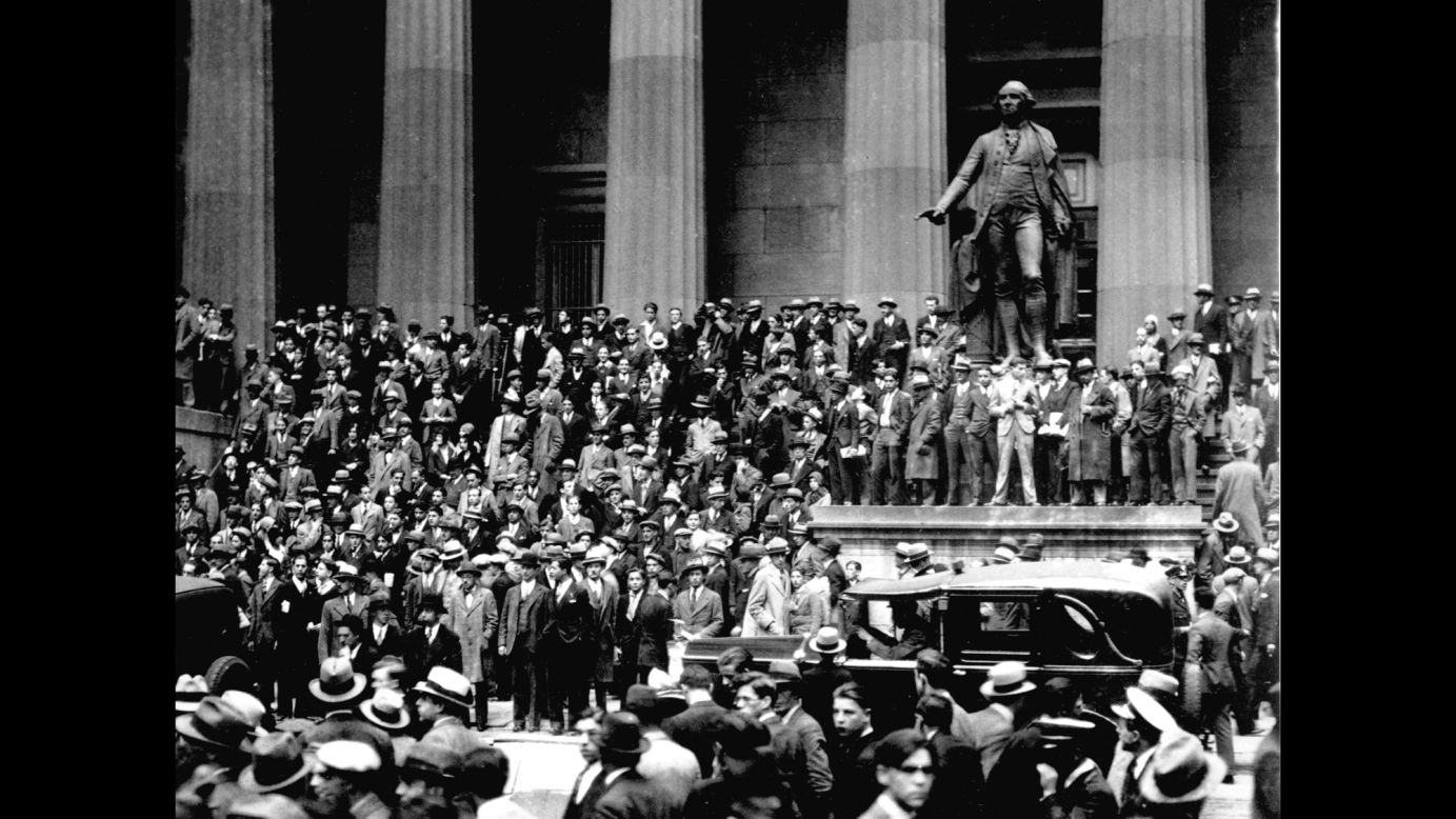 People gathered across from the New York Stock Exchange on "Black Thursday," October 24, 1929. The stock market crash of 1929, fueled by excessive speculation on Wall Street, set off the Great Depression.    