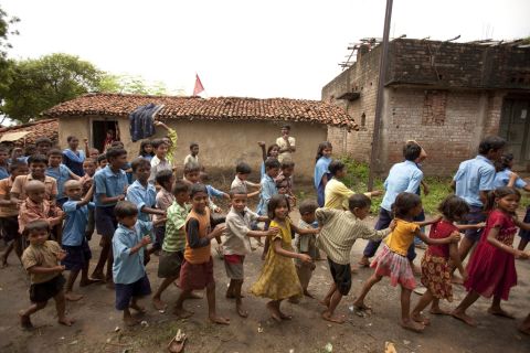 Children march through the streets of Ghorahuan Village, Bihar, singing songs about Albendezole to educate the community about its benefits. 