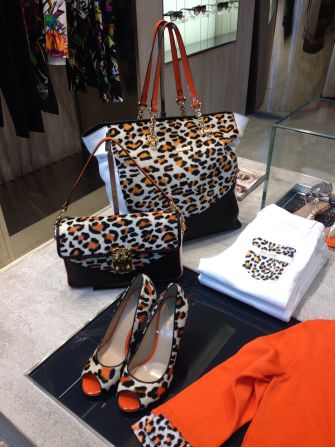 Orange may never be the new black, but Just Cavalli's mix with leopard print is fun and interesting. 