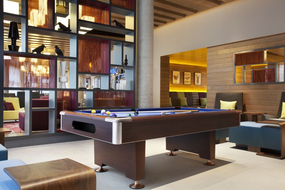 Like many contemporary-minded hotels, the Aloft brand has put a heavy emphasis on its communal spaces. The lobbies (dubbed the re:mix Lounge) are often outfitted with pool tables, board games, LCD screens, and various other features aimed at getting guests mingling. Guests can use their mobile phone both to check in, and in place of a room key. 