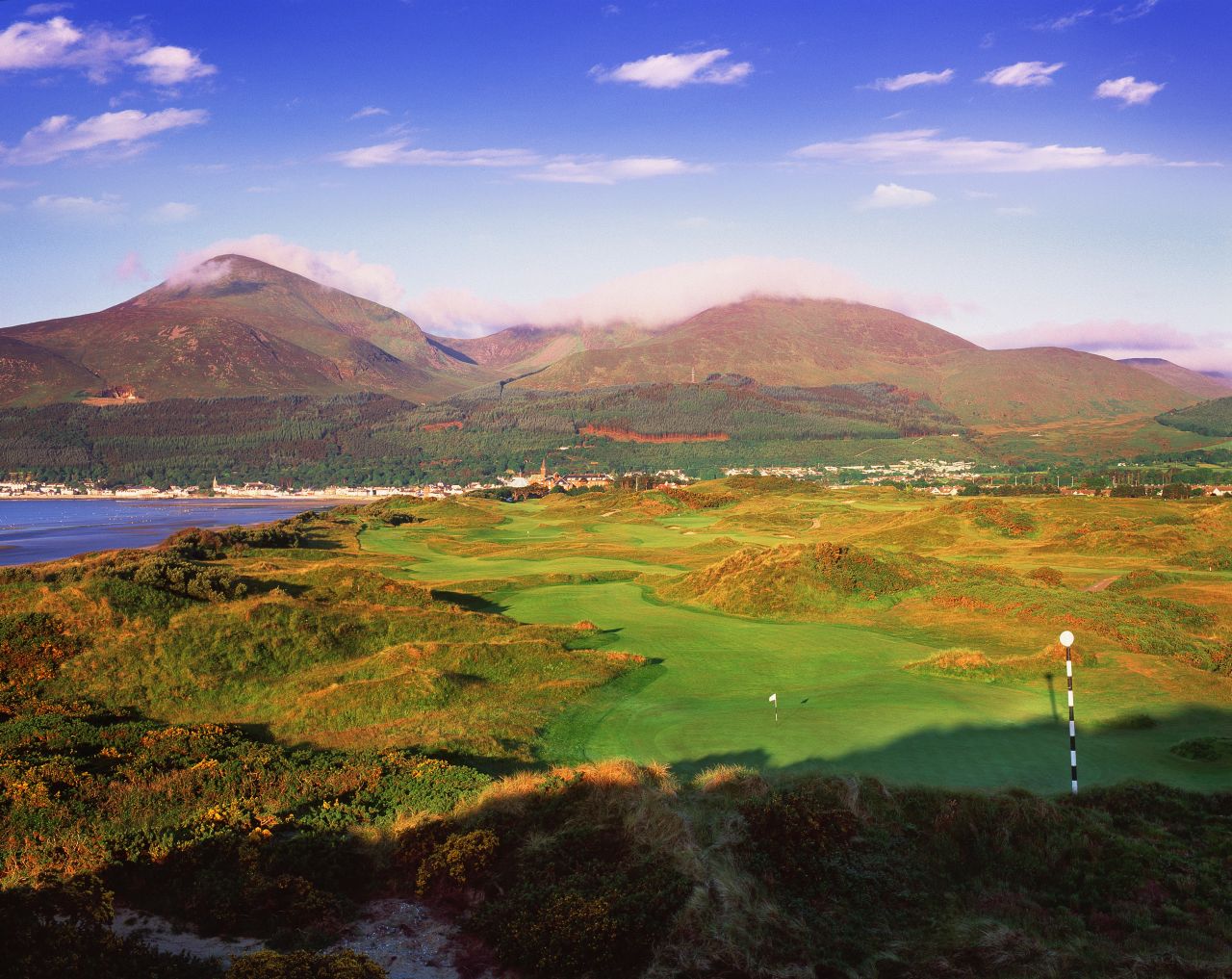 Though it's never hosted a professional major, Royal County Down is a worthy inclusion on any golfer's wish list. The magical links course is perennially voted one of the best in the world.