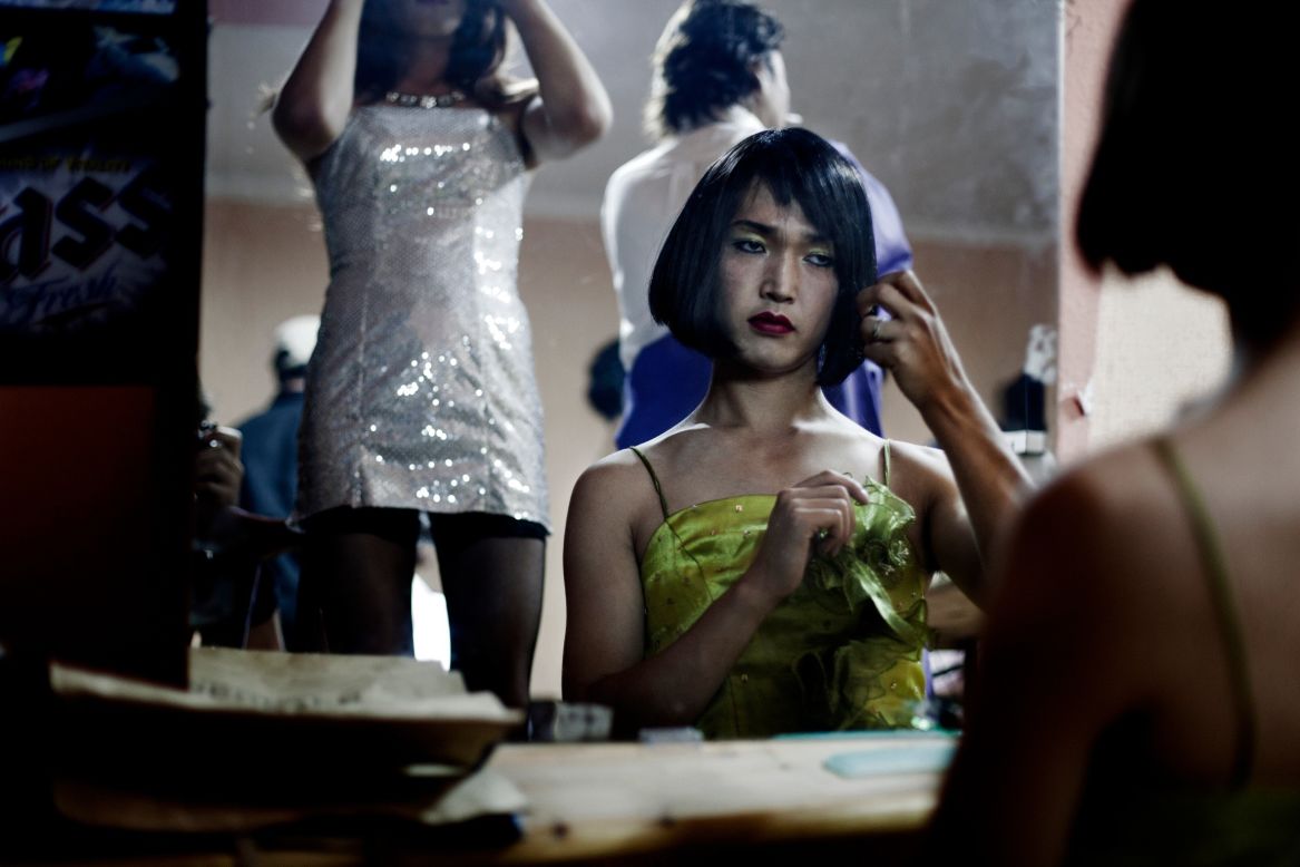 For transgender people in Ulaanbaatar, life goes on behind closed doors. The only places where they can safely express themselves are underground clubs and private parties, some of which Laiz was fortunate enough to be invited to:" Actually, I have to say they organize the best parties in the city," he points out. Here Nurbul, a professional dancer, prepares herself for a private show at a gay party in Ulaanbaatar. 