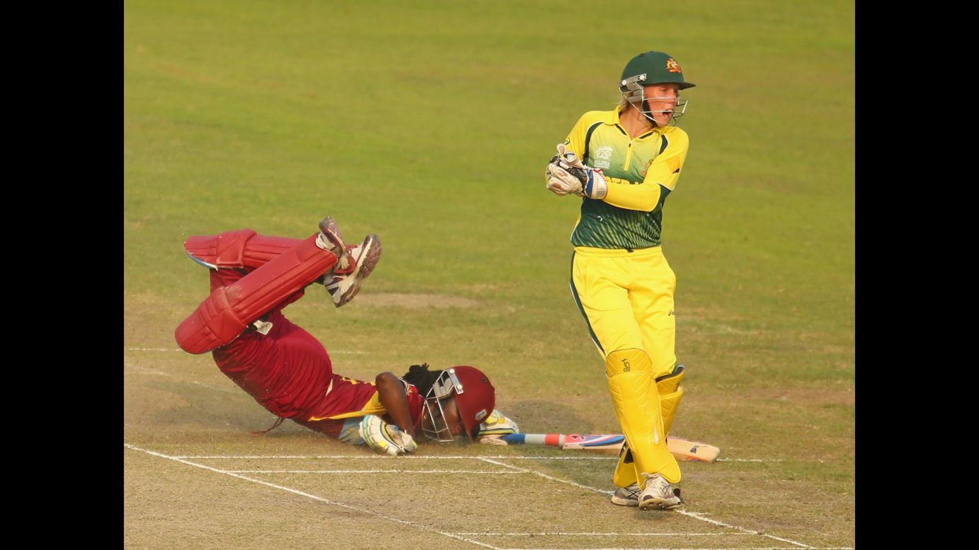 West Indies cricket player Stefanie Taylor dives but is run out by Australia's Alyssa Healy during a Women's World Twenty20 match Thursday, April 3, in Dhaka, Bangladesh. <a href="http://www.cnn.com/2014/04/01/worldsport/gallery/what-a-shot-0401/index.html">See 34 amazing sports photos from last week</a>