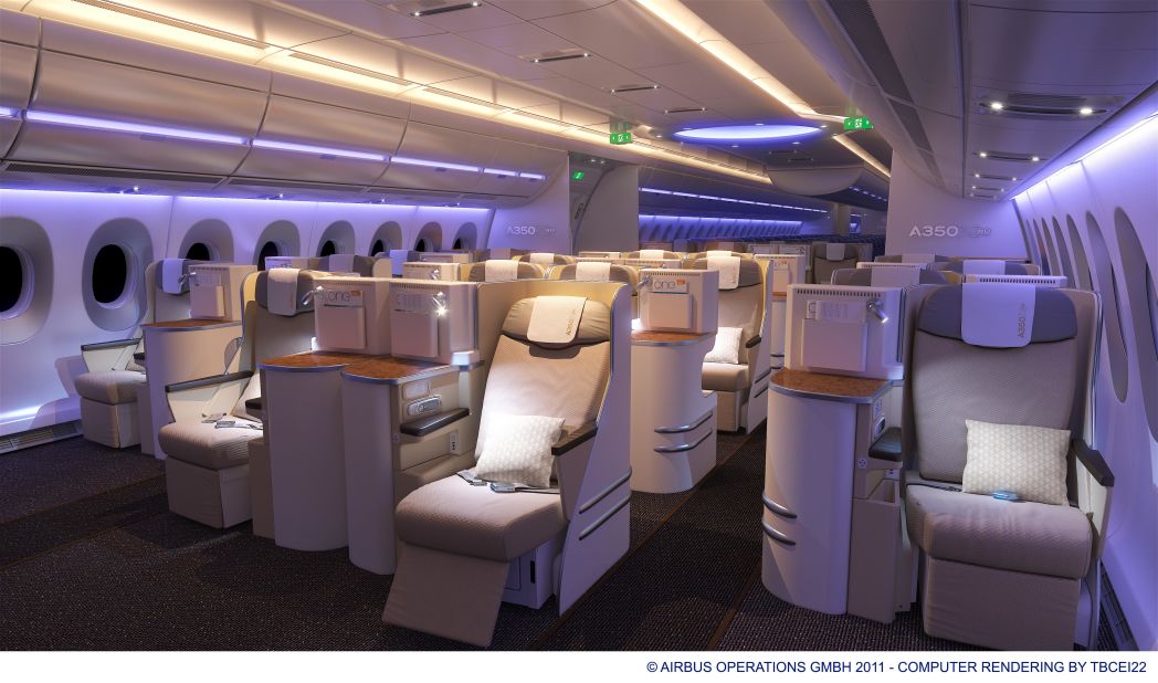 Airbus unveiled the interior cabin on two of its A350 XWB test planes. LED lighting and near-vertical side walls are two of the plane-maker's innovations. 