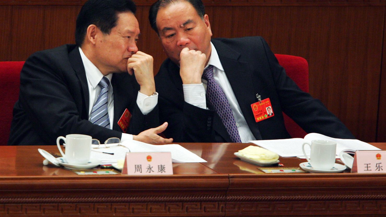 Politburo member Zhou Yongkang (left) and Wang Lequan (right), Communist party secretary of Xinjiang.