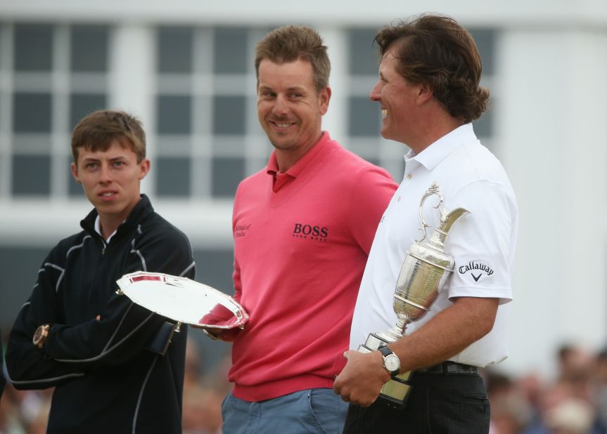 Fitzpatrick won the Silver Medal at the 2013 British Open, as the tournament's leading amateur to complete all 72 holes. He is pictured with runner-up Henrik Stenson (center) and winner Phil Mickelson.