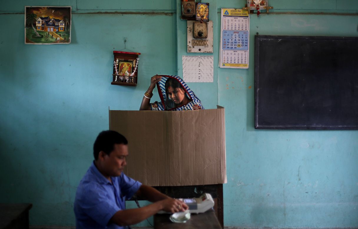 APRIL 8 - DIBRUGARH, INDIA: A woman casts her vote during the Indian election, the world's biggest poll ever. The country's <a href="http://edition.cnn.com/2014/04/06/world/asia/india-elections-explainer/index.html?hpt=ibu_c1">814 million eligible voters will decide</a> between a controversial but popular Hindu nationalist and a member of the Nehru-Gandhi dynasty.