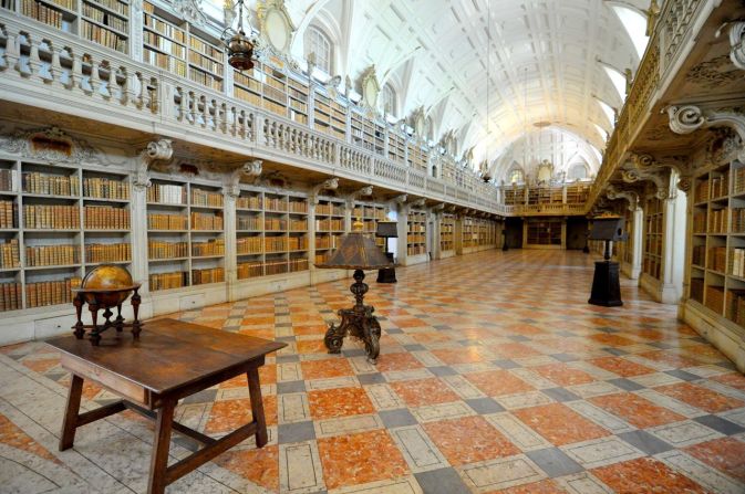 The <a href="http://www.golisbon.com/portugal/cities/mafra.html" target="_blank" target="_blank">library</a> of the <a href="http://ireport.cnn.com/docs/DOC-1116265">National Palace in Mafra</a>, Portugal, is embellished with marble and contains 35,000 volumes, which include a trilingual Bible from 1514 and the earliest edition of Homer in Greek. 