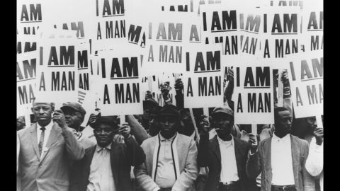 Memphis sanitation workers hold signs with the slogan "I am a man" during a strike in 1968. Their campaign against discrimination and poor conditions in the workplace brought King to Memphis.