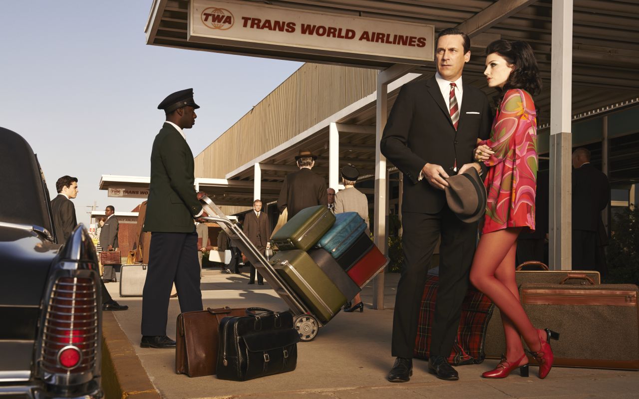 Don and Megan Draper show up to the airport in fashionably bright colors in this promotional photo for the seventh season. While researching 1960s fashion, Przybyszewski was surprised to find that women's dresses in the late 1960s could be even shorter than Megan's. The money spent on tights and pantyhose worn with these dresses was "mind-boggling," she said.