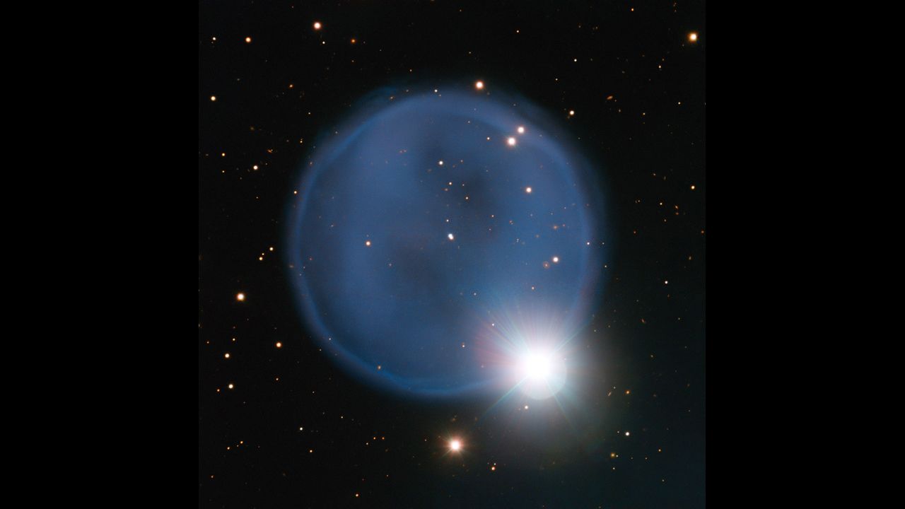 Planetary nebula Abell 33 appears ring-like in this image, taken using the European Southern Observatory's Very Large Telescope. The blue bubble was created when an aging star shed its outer layers and a star in the foreground happened to align with it to create a "diamond engagement ring" effect.