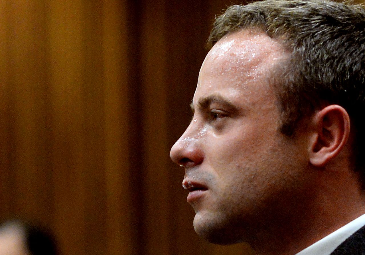 Pistorius cries as he listens to cross-questioning on March 10.