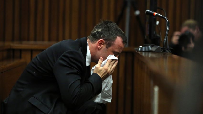 Oscar Pistorius weeps as he listens to evidence by a pathologist in court in Pretoria, South Africa, Monday, April 7, 2014. 