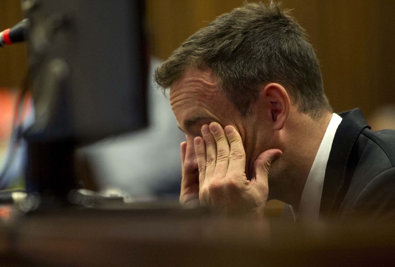 Pistorius rubs his eyes during his trial on April 7.