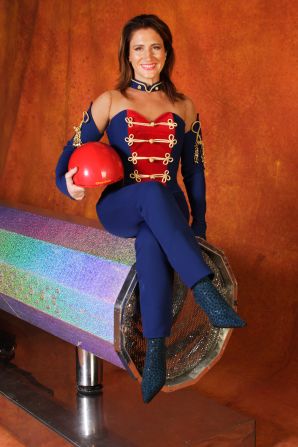 Two decades later she goes by the stage name "Shooting Star," working alongside her human cannonball husband, Chachi.