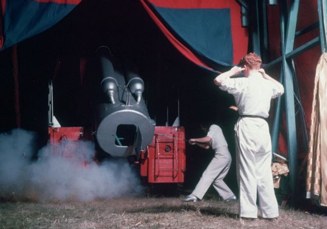 Two stage hands fire a human cannonball at a Chipperfield's Circus in the 1950s. The inner-workings of the barrel is a guarded secret by human cannonballs. 