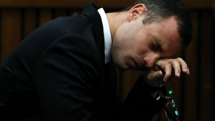 South African Paralympic track star Oscar Pistorius reacts during his trial for the murder of his girlfriend Reeva Steenkamp, at the North Gauteng High Court in Pretoria, on April 7, 2014.