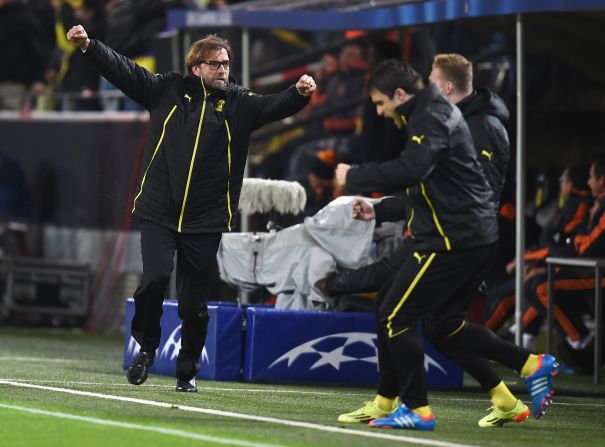 That goal brought Dortmund manager Jurgen Klopp, left, to his feet.
