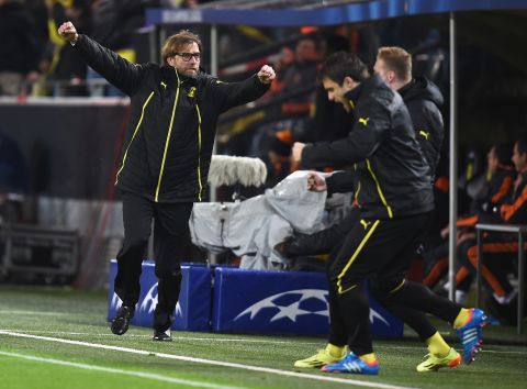 That goal brought Dortmund manager Jurgen Klopp, left, to his feet. 
