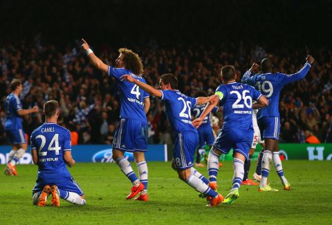 Chelsea players celebrate after overcoming Paris Saint-Germain on away goals to reach the Champions League semifinals.