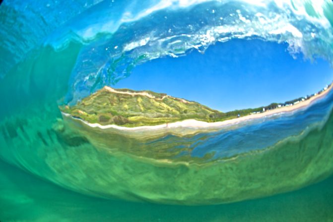 "This is a shot from the back of a wave as it passes me" at Sandy Beach. 