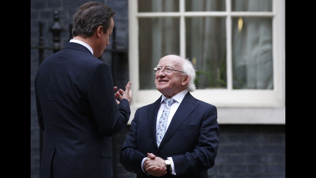 British Prime Minister David Cameron talks with Higgins outside 10 Downing St. in London on Wednesday, April 9.