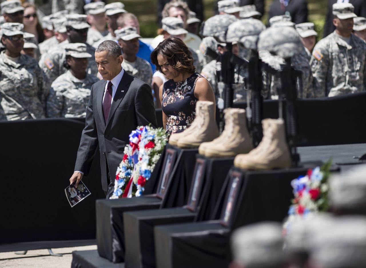Obama and first lady Michelle Obama arrive for a memorial service in Fort Hood, Texas, in April 2014. Officials say Army Spc. Ivan Lopez took a .45-caliber handgun onto the military post, killing three people and injuring 16 before taking his own life.