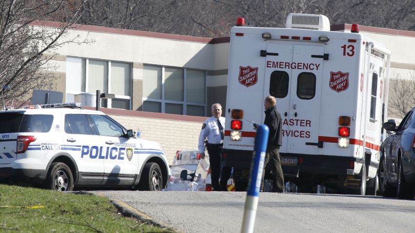 Emergency responders gather in the parking lot of the high school on the campus of the Franklin Regional School District where several people were stabbed at Franklin Regional High School on Wednesday, April 9, 2014, in Murrysville, Pa., near Pittsburgh. The suspect, a male student, was taken into custody and being questioned. (AP Photo/Keith Srakocic)