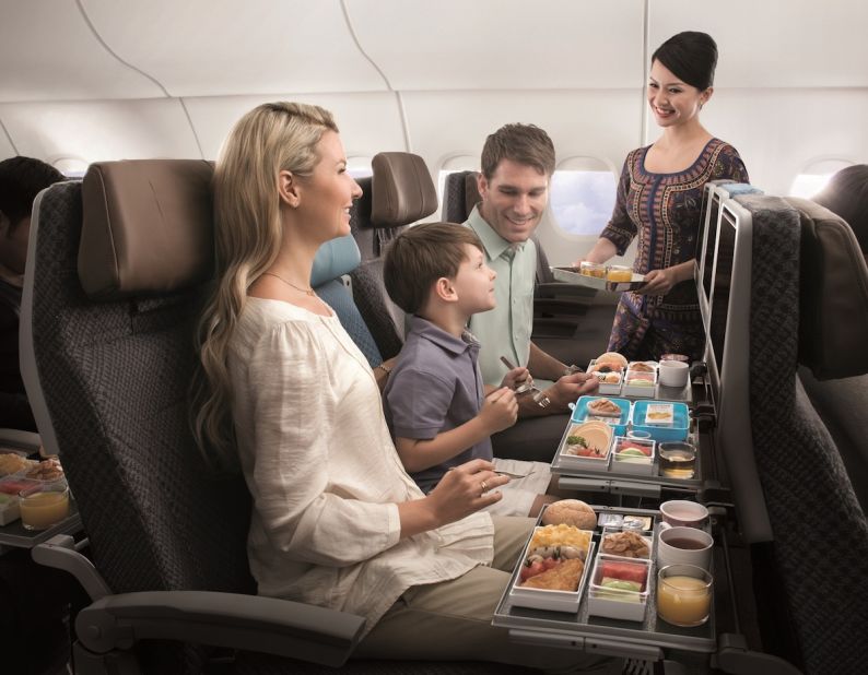 Now that's one happy looking family. They clearly remembered to pre-order the kids' meal prior to their flight. 