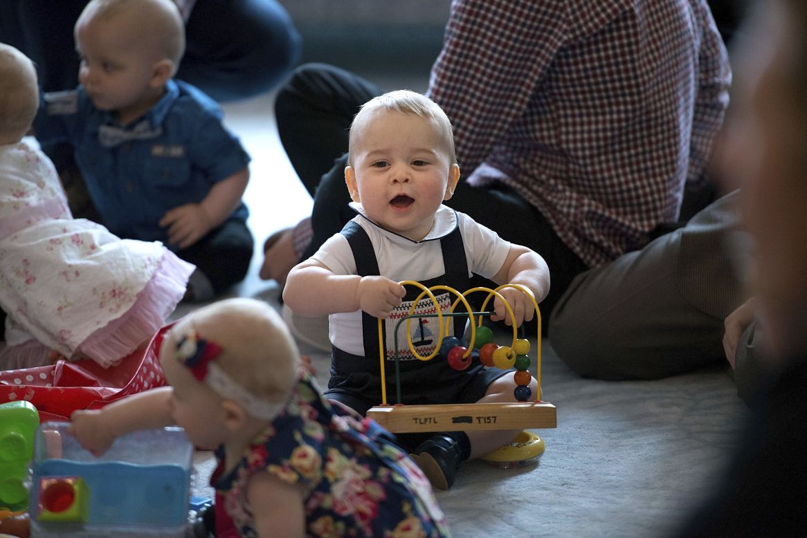WELLINGTON, NEW ZEALAND: Britain's Prince George plays during a visit to a parents group, his first ever public engagement. The eight-month-old future king is on a<a href="http://edition.cnn.com/2014/04/06/world/asia/royal-family-new-zealand-visit/index.html?iid=article_sidebar"> tour of New Zealand and Australia</a> with his parents, the Duke and Duchess of Cambridge. 
