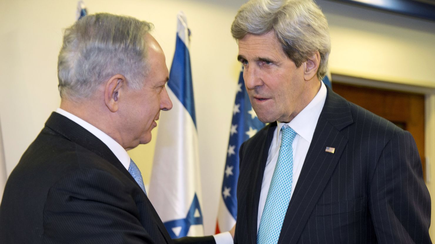 U.S. Secretary of State John Kerry (right) meets with Israeli PM Benjamin Netanyahu in Jerusalem on March 31, 2014. 