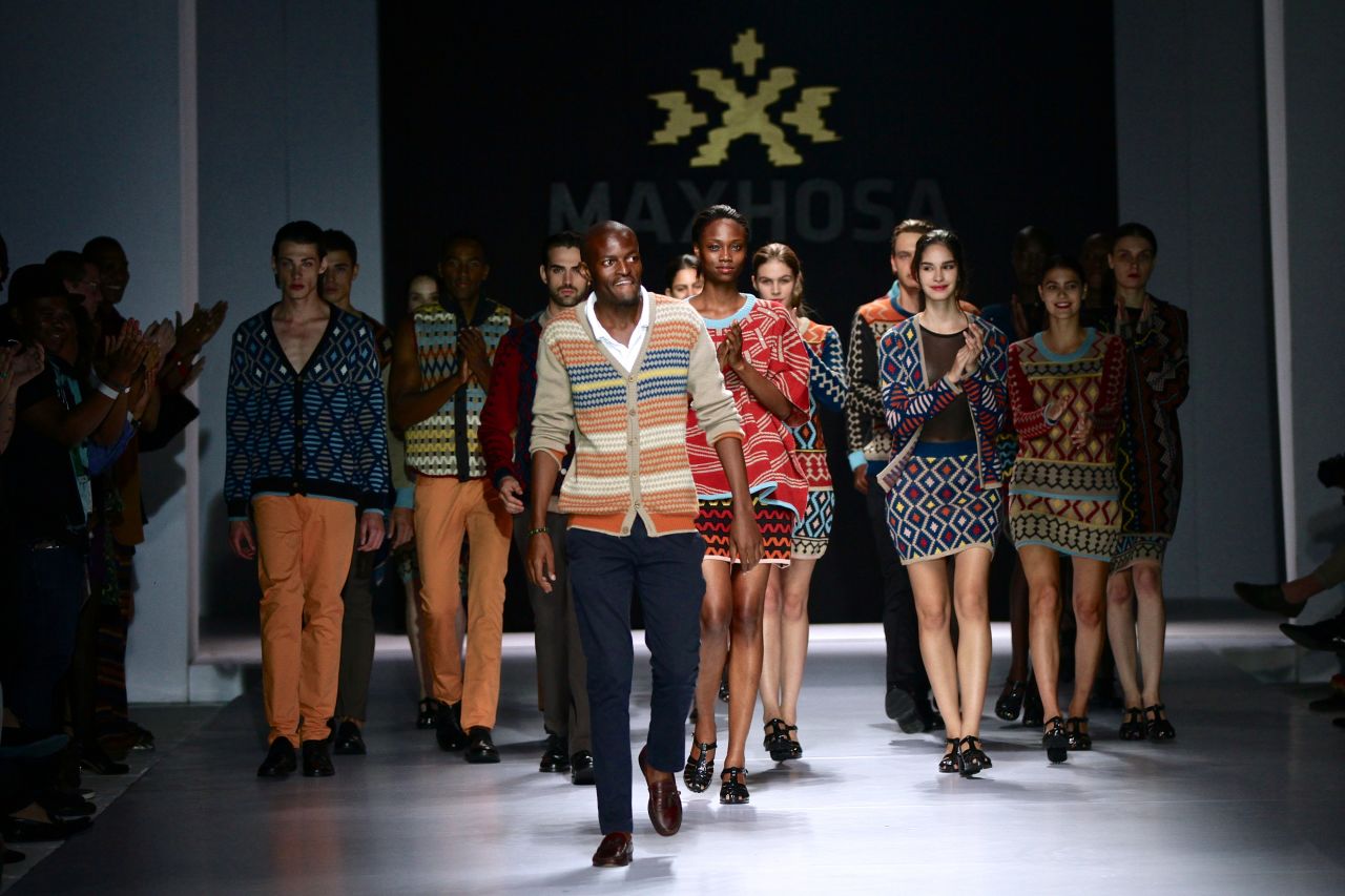 Ngxokolo (center) is a staple at international fashion weeks. He showcased his work at Labo Ethnik Fashion Week in Paris.