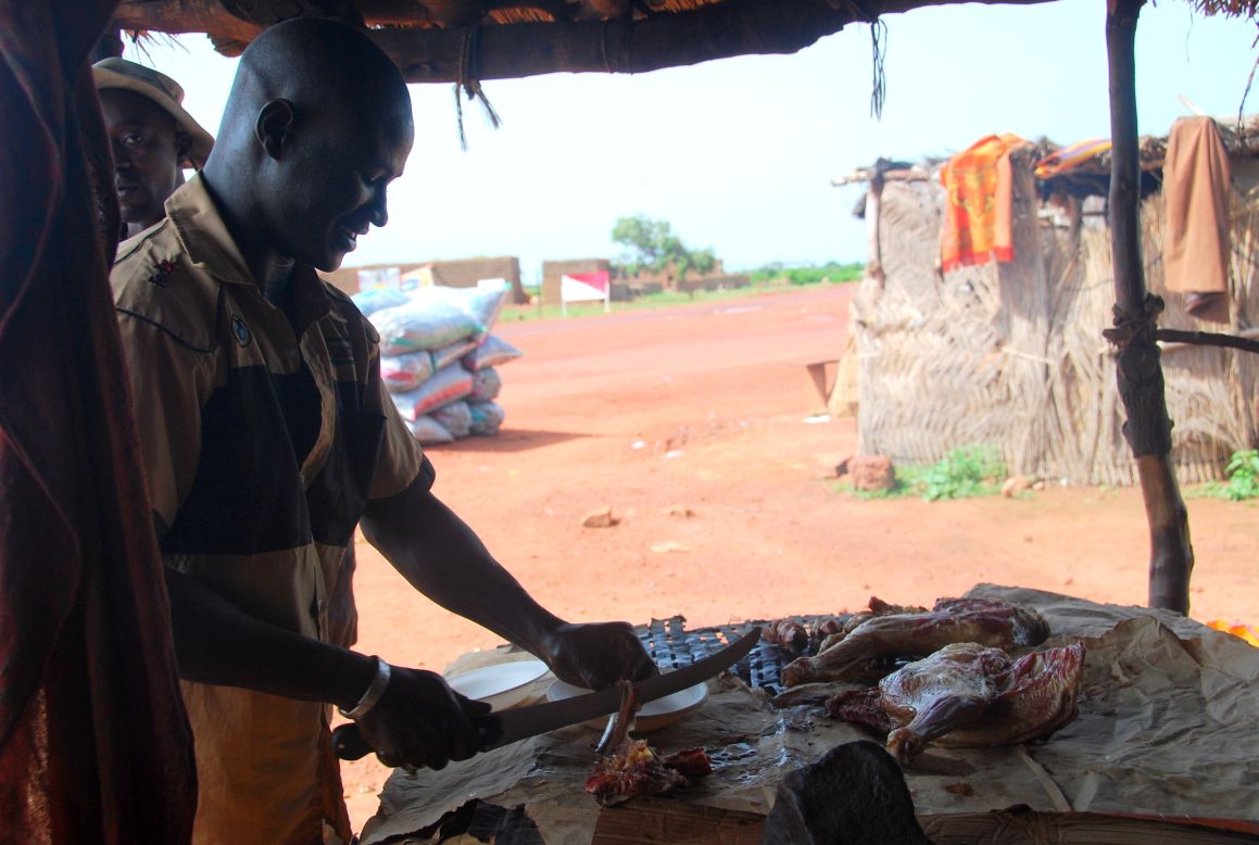 Khoo took this photo of a stall selling goat meat as she was traveling in Mali's Dogon region in September 2010. "We were at this eatery specifically to have a meal of goat barbecue ... for breakfast," she said. <br /><br />"One look at the goat leg hanging up in the blazing sun and I have to admit, I was a bit hesitant to try it but eventually I did take a few bites. Surprisingly, it wasn't bad -- the meat was fresh, simply grilled and lightly sprinkled with a spice mix of some sort."