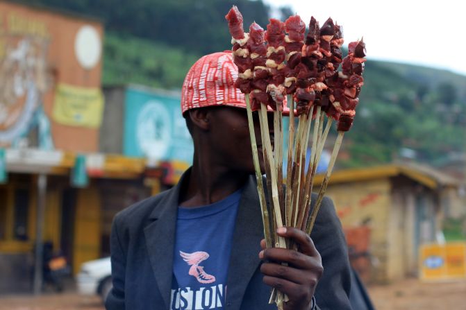 Adam Cohn from Seattle captured this image in Uganda in April 2011. "Beef and lamb skewers grilled over small charcoal stoves are a common street food. Guys were selling skewers at a small junction town on the Kabale-Mbarara Road, near Kandago. The grill is made of a motor vehicle wheel with legs welded to it, which is very common," he said. <br /><br />The street food in Uganda was so good that Adam has tried to recreate it at home. "I miss 'Rolex' the most. Rolex is a flour chapati wrapped around scrambled eggs, shallots and cabbage. In fact I made it for dinner last night!"