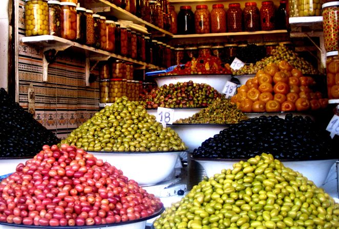 Sara Ruedy Quigley from Richmond, Virginia, took this photo on a business trip in October 2011 at a souk in Marrakech, offering a huge choice of different olives. <br /><br />Despite the variety of food on offer, Sara also enjoyed something quite ordinary: "It may seem simple, but bread is a great street food in Morocco. The breads are used to dip into tagines, olive oil dishes, or enjoyed alone with Morocco's famous mint tea. Steamed sheep head is a very popular street food, but I don't want to go anywhere near that."