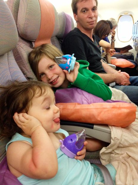 Sleeping on Long International Flights with Kids: Hacks & Products
