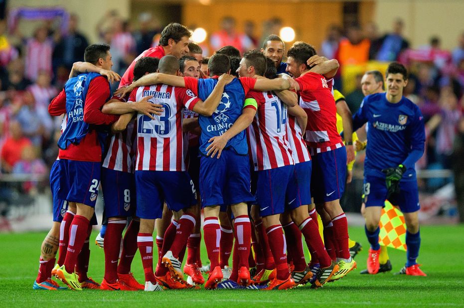 Atletico Madrid players celebrate following their 1-0 win over Barcelona -- 2-1 on aggregate. Atletico has never won the Champions League and lost to Bayern Munich in its only appearance in the final back in 1974.