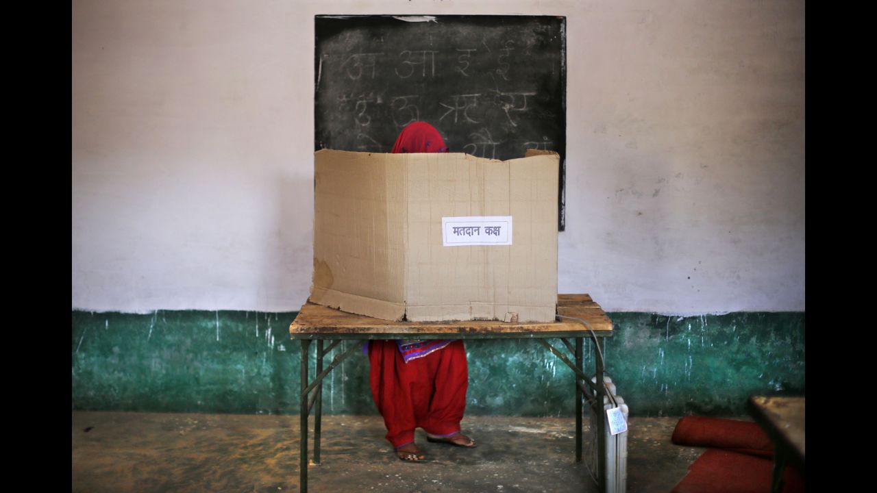 A woman casts her vote in Muzaffarnagar, India, on April 10. 