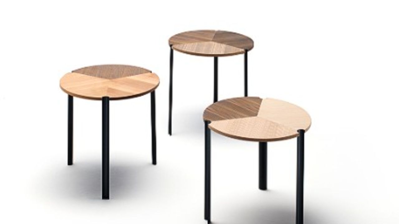 These stackable modular wooden coffee tables, designed by David Lopez Quincoces, were on display in Milan - (Courtesy Living Divani)