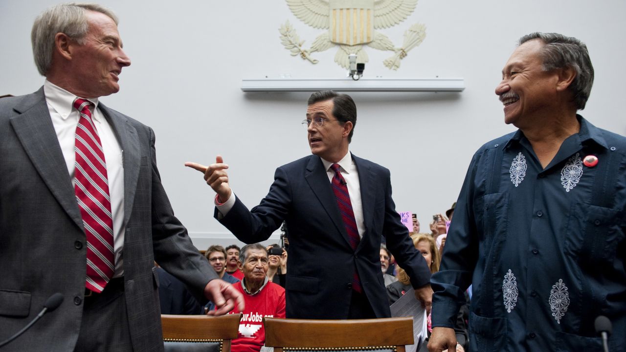 In September 2010, Colbert testified at a hearing on immigration. He took time to chat with Phil Glaize, chairman of the U.S. Apple Association, left, and Arturo Rodriguez, president of the United Farm Workers. Again, <a href="http://gawker.com/5647044/stephen-colbert-testifies-before-congress-despite-being-asked-to-leave" target="_blank" target="_blank">some representatives didn't get Colbert</a>. 