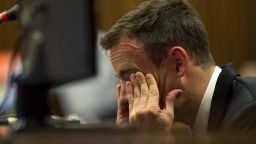 Oscar Pistorius reacts as he listens to evidence by a pathologist in court in Pretoria, South Africa, Monday, April 7, 2014.