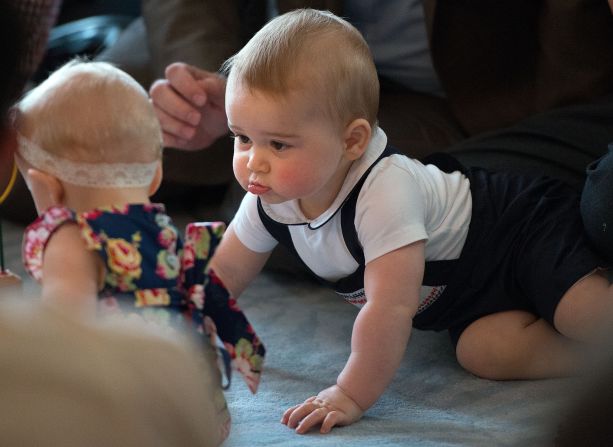 Britain's Prince George looks at other babies during an event Wednesday, April 9, at the Government House in Wellington, New Zealand. His parents, the Duke and Duchess of Cambridge, are on a <a href="http://www.cnn.com/2014/04/06/world/gallery/royal-tour-new-zealand-australia/index.html">three-week tour</a> of New Zealand and Australia.