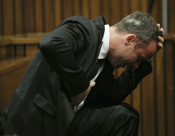 Oscar Pistorius becomes emotional during <a href="http://www.cnn.com/2014/03/03/africa/gallery/pistorius-2014-trial/index.html">his murder trial</a> Monday, April 7, in Pretoria, South Africa. The track star, accused of intentionally killing his girlfriend, Reeva Steenkamp, took the witness stand in his own defense.