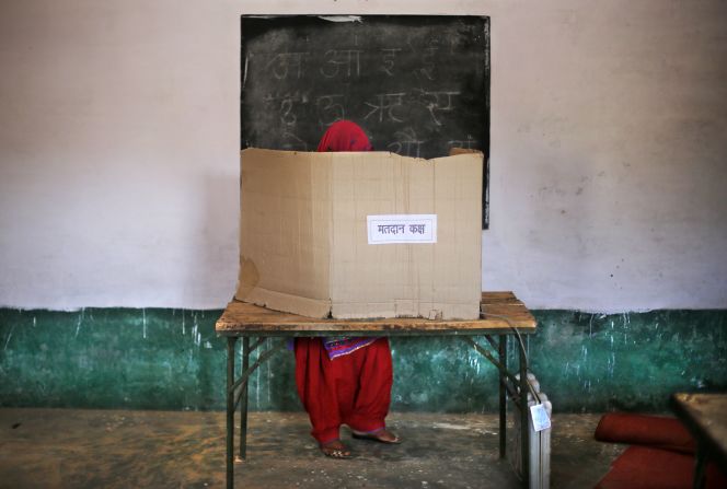 A woman casts her vote in Muzaffarnagar, India, on Thursday, April 10. India's <a href="http://www.cnn.com/2014/04/07/world/gallery/india-elections-2014/index.html">general election</a> is being held in stages over five weeks. Voters will elect 543 members to the lower house of parliament, which will then select the country's next prime minister. Prime Minister Manmohan Singh is stepping aside after a decade in charge.