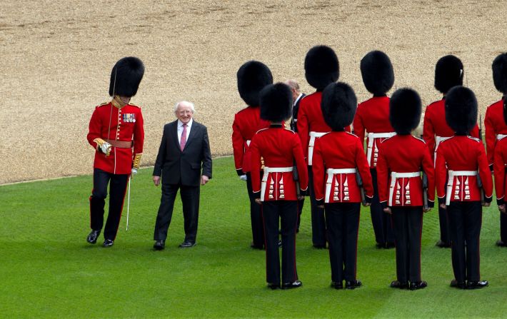 Irish President Michael D. Higgins inspects a guard of honor at Windsor Castle, west of London, on Tuesday, April 8. Higgins is the first Irish head of state to make a <a href="http://www.cnn.com/2014/04/09/europe/gallery/irish-president-state-visit-britain/index.html">state visit</a> to the United Kingdom. <a href="http://www.cnn.com/2014/04/04/world/gallery/week-in-photos-0403/index.html">See last week in 33 photos</a>