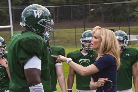 In this scene from 2009's "The Blind Side," Quinton Aaron, playing Michael Oher, is "coached" by Sandra Bullock as Leigh Anne Tuohy. Bullock's Oscar cemented her A-list status.