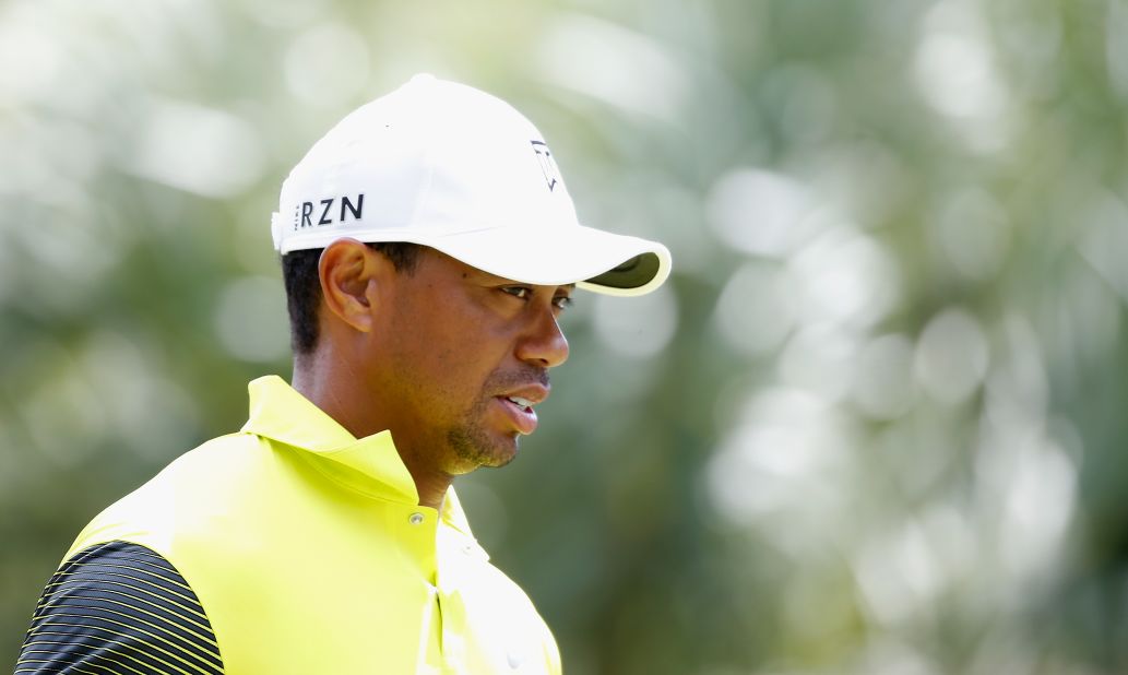 No, world No. 1 Tiger Woods isn't playing at the Masters. He's out following back surgery. 